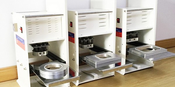 Foil cup sealing machine
